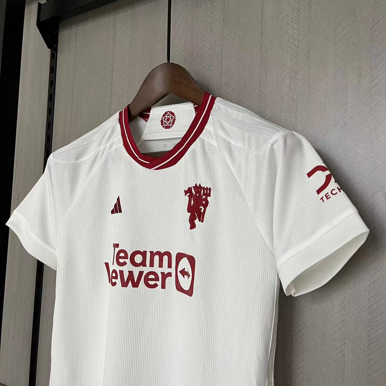 KIT INFANTIL MANCHESTER UNITED THIRD 23/24