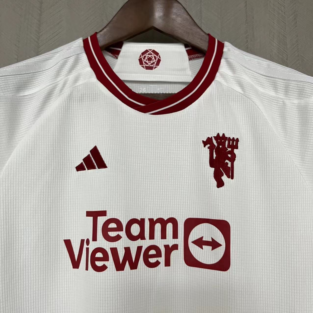 KIT INFANTIL MANCHESTER UNITED THIRD 23/24