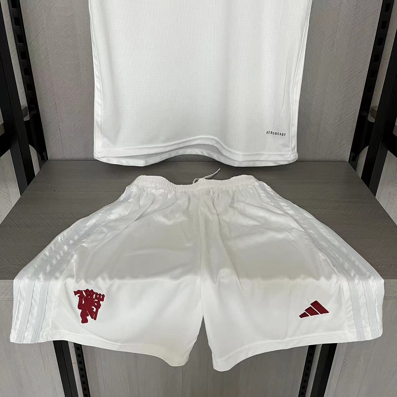 KIT INFANTIL MANCHESTER UNITED THIRD 23/24