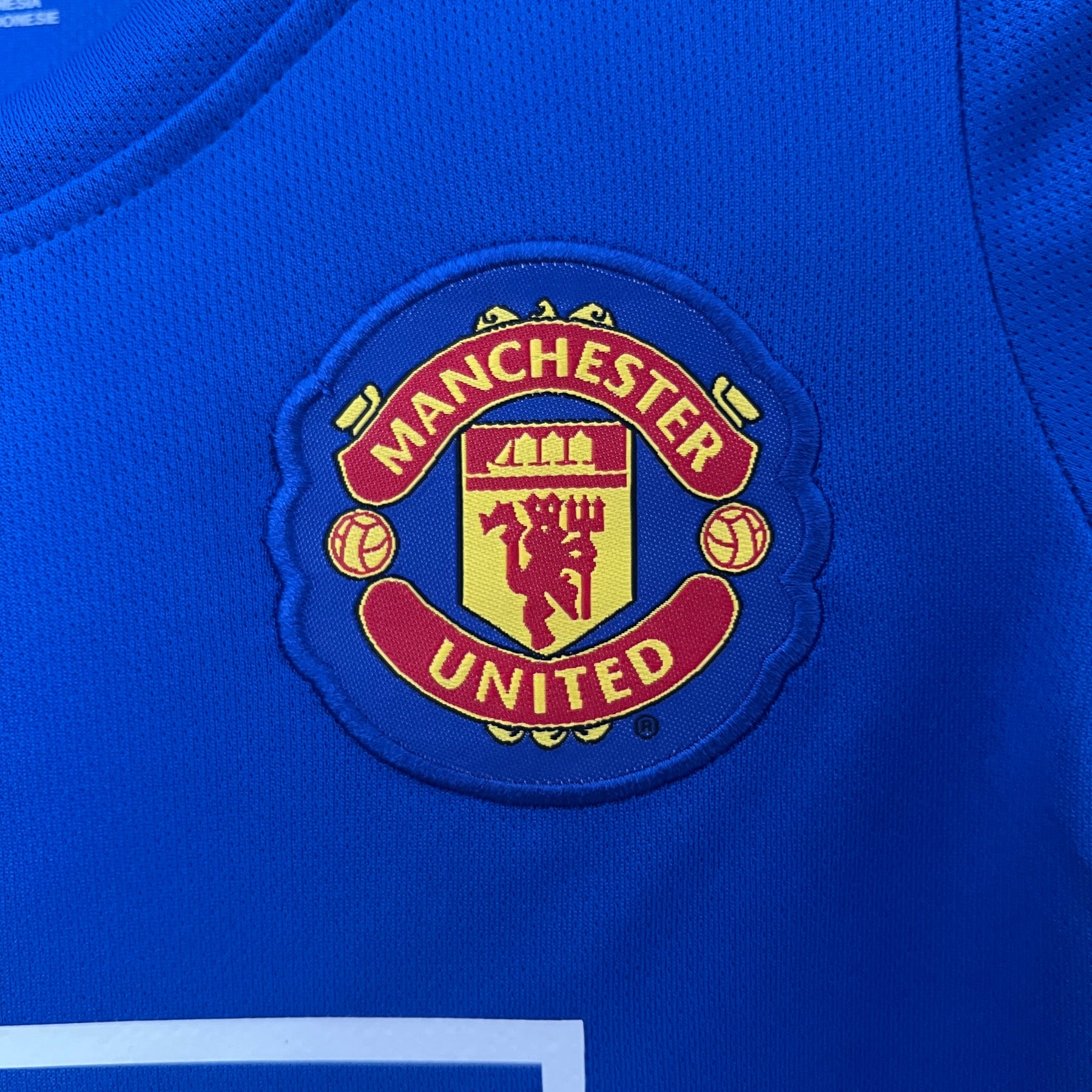 KIT INFANTIL RETRÔ MANCHESTER UNITED BLUE 08/09