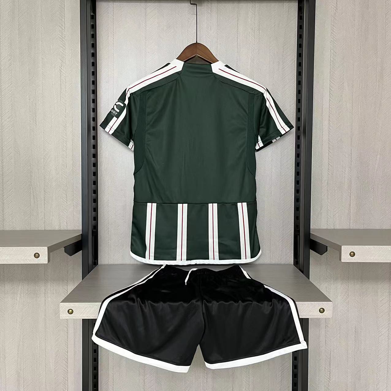 KIT INFANTIL MANCHESTER UNITED AWAY 23/24