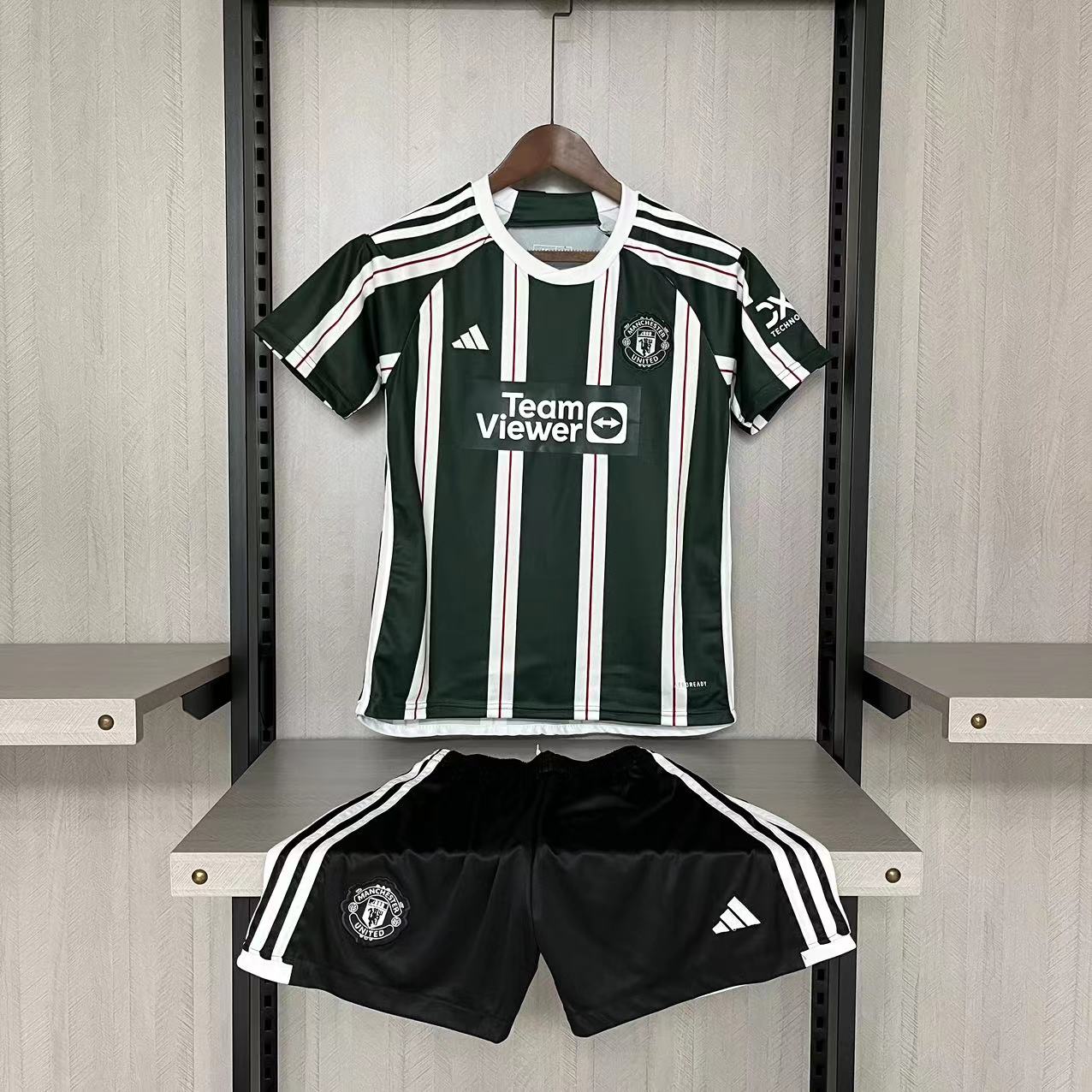 KIT INFANTIL MANCHESTER UNITED AWAY 23/24