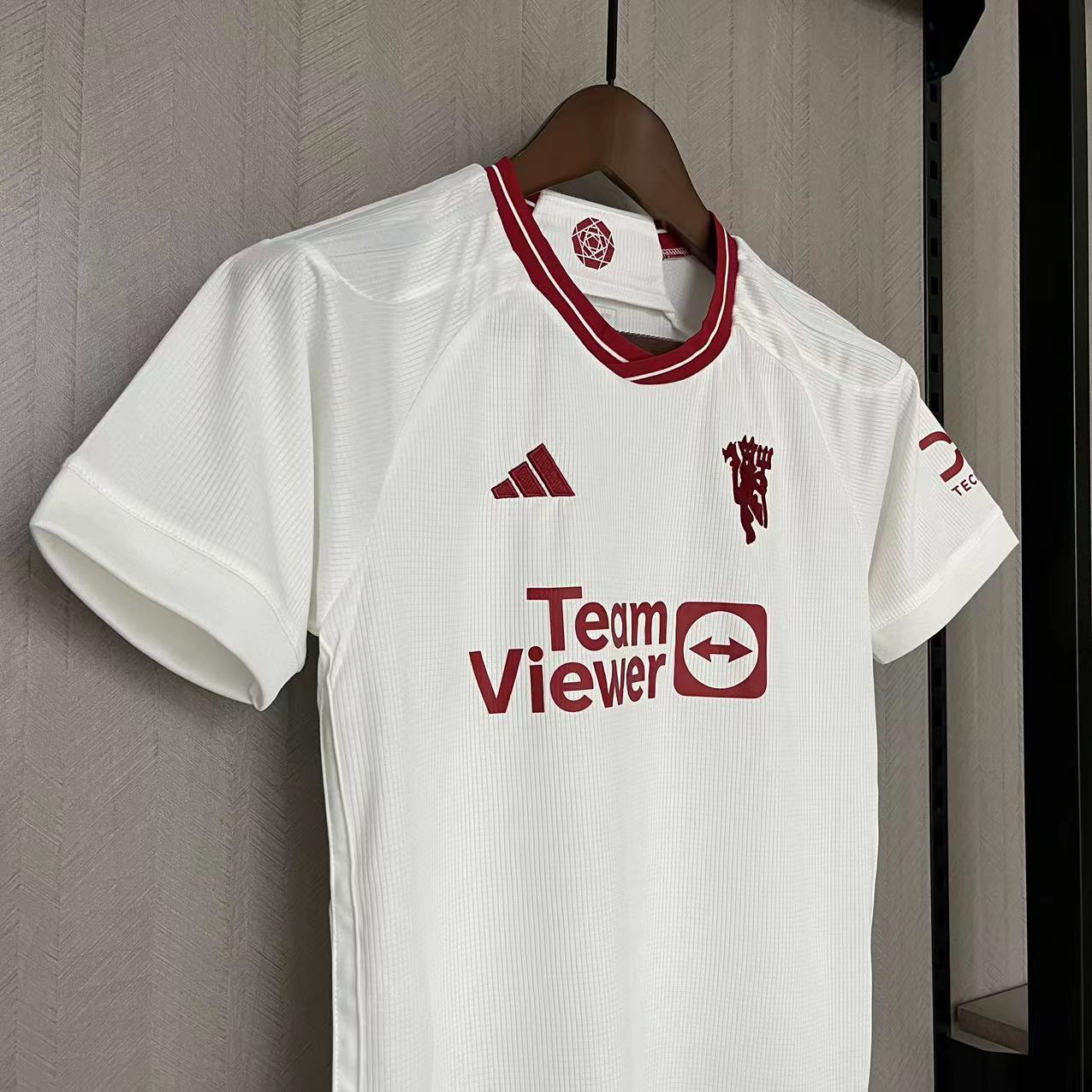 KIT INFANTIL MANCHESTER UNITED THIRD 23/24