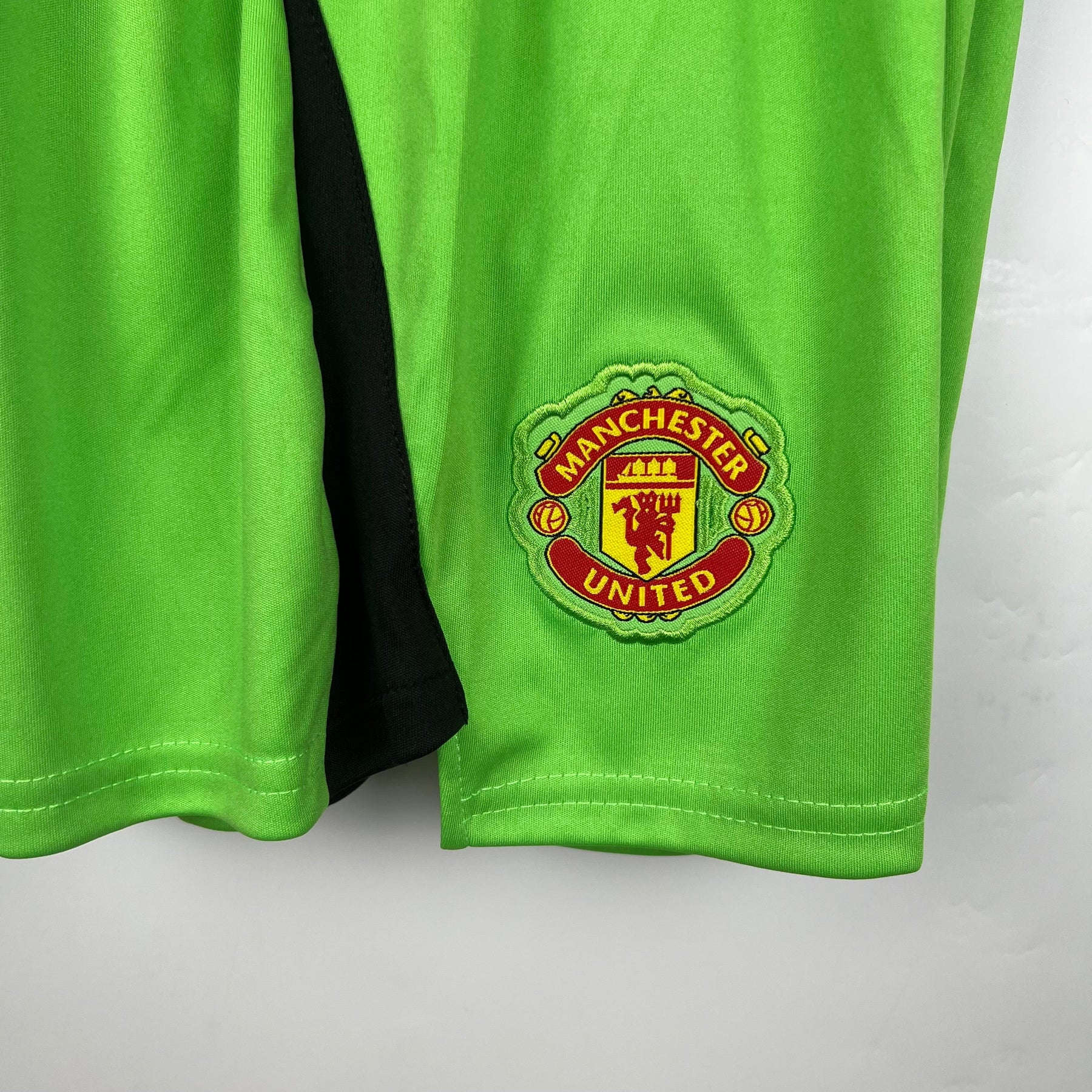 KIT INFANTIL MANCHESTER UNITED GOLEIRO GREEN 23/24