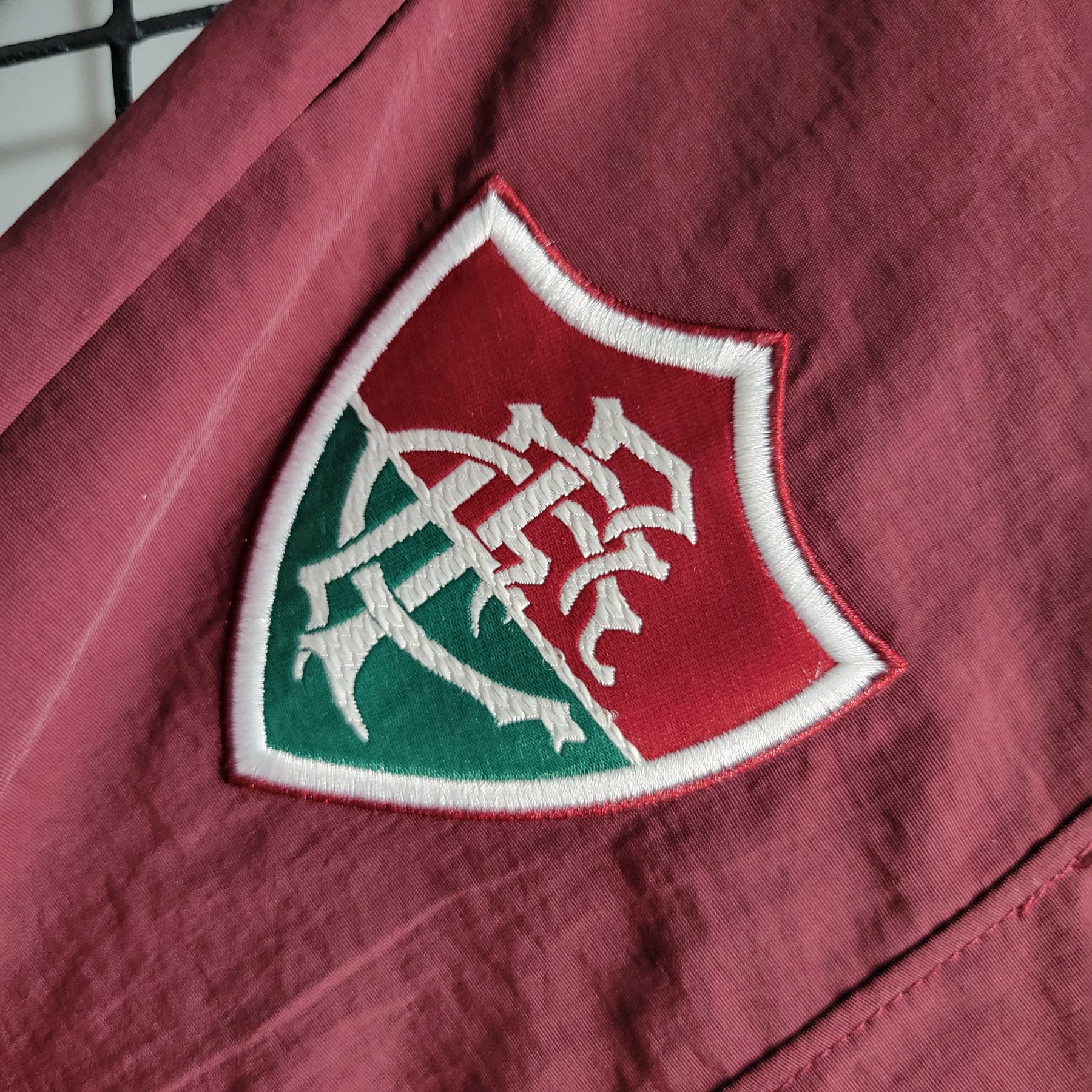 CORTA-VENTO FLUMINENSE GRENÁ 23/24