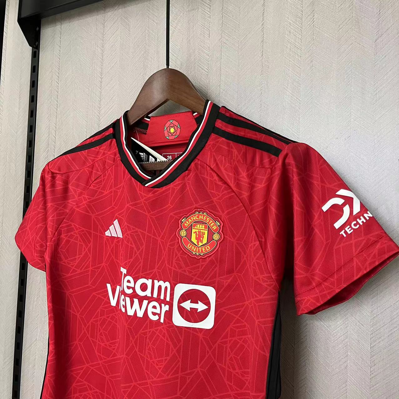 KIT INFANTIL MANCHESTER UNITED HOME 23/24