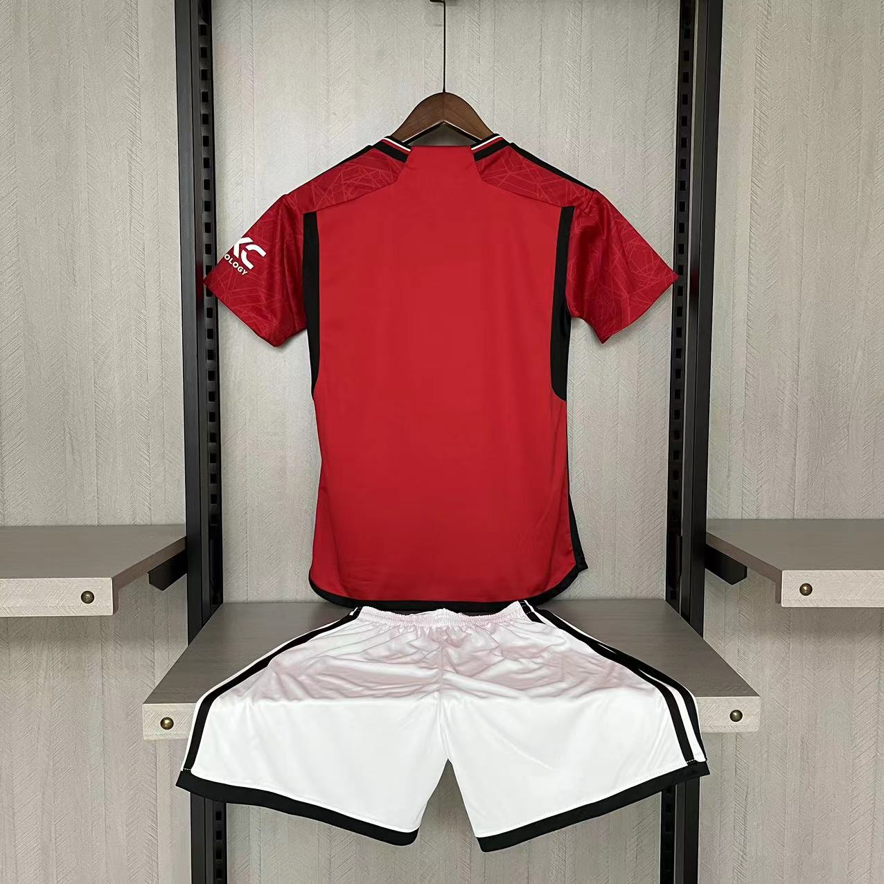 KIT INFANTIL MANCHESTER UNITED HOME 23/24