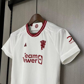 KIT INFANTIL MANCHESTER UNITED THIRD 23/24