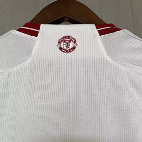 KIT INFANTIL MANCHESTER UNITED THIRD 23/24