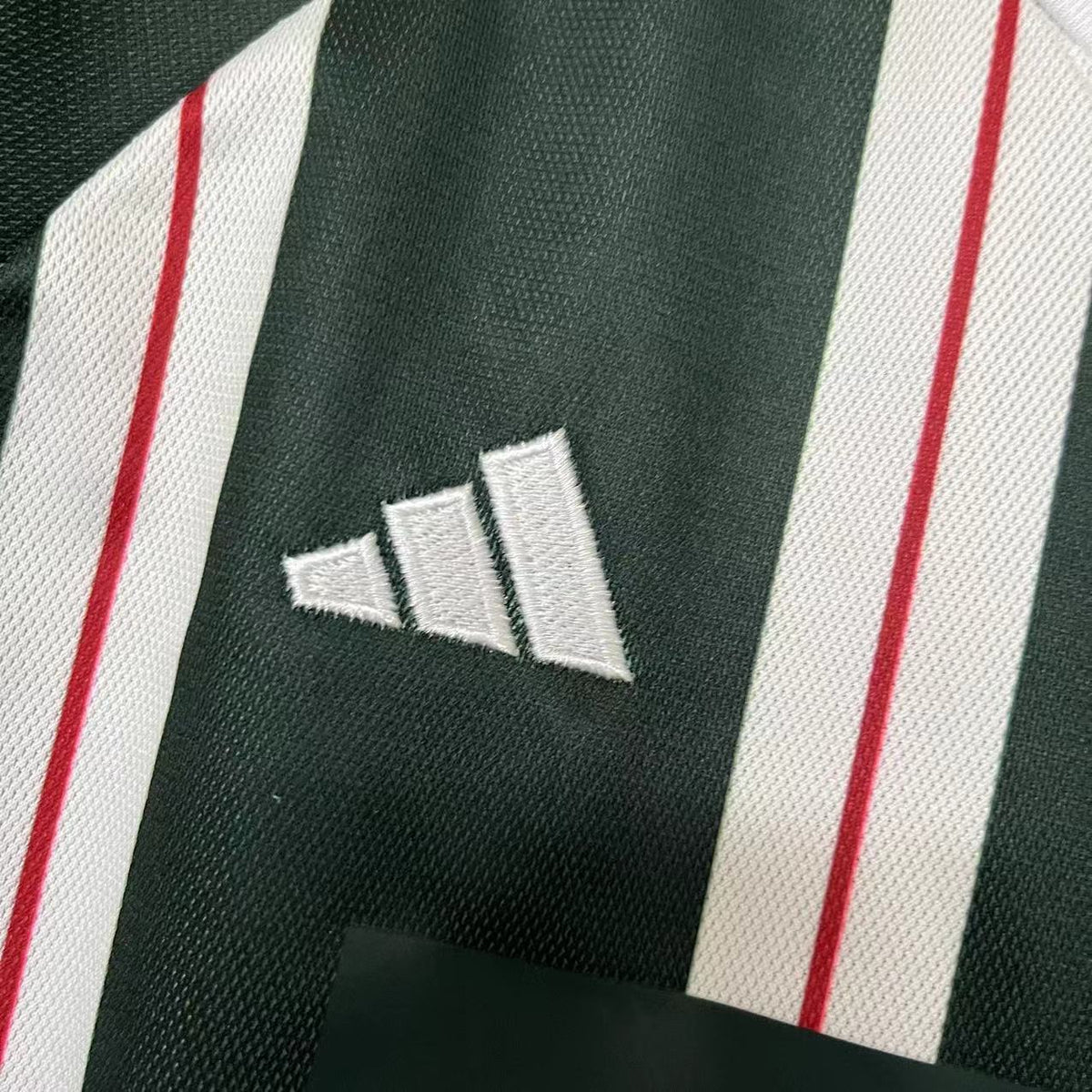 KIT INFANTIL MANCHESTER UNITED AWAY 23/24