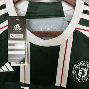 KIT INFANTIL MANCHESTER UNITED AWAY 23/24