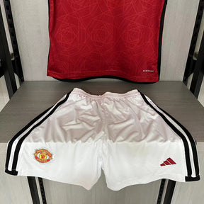 KIT INFANTIL MANCHESTER UNITED HOME 23/24