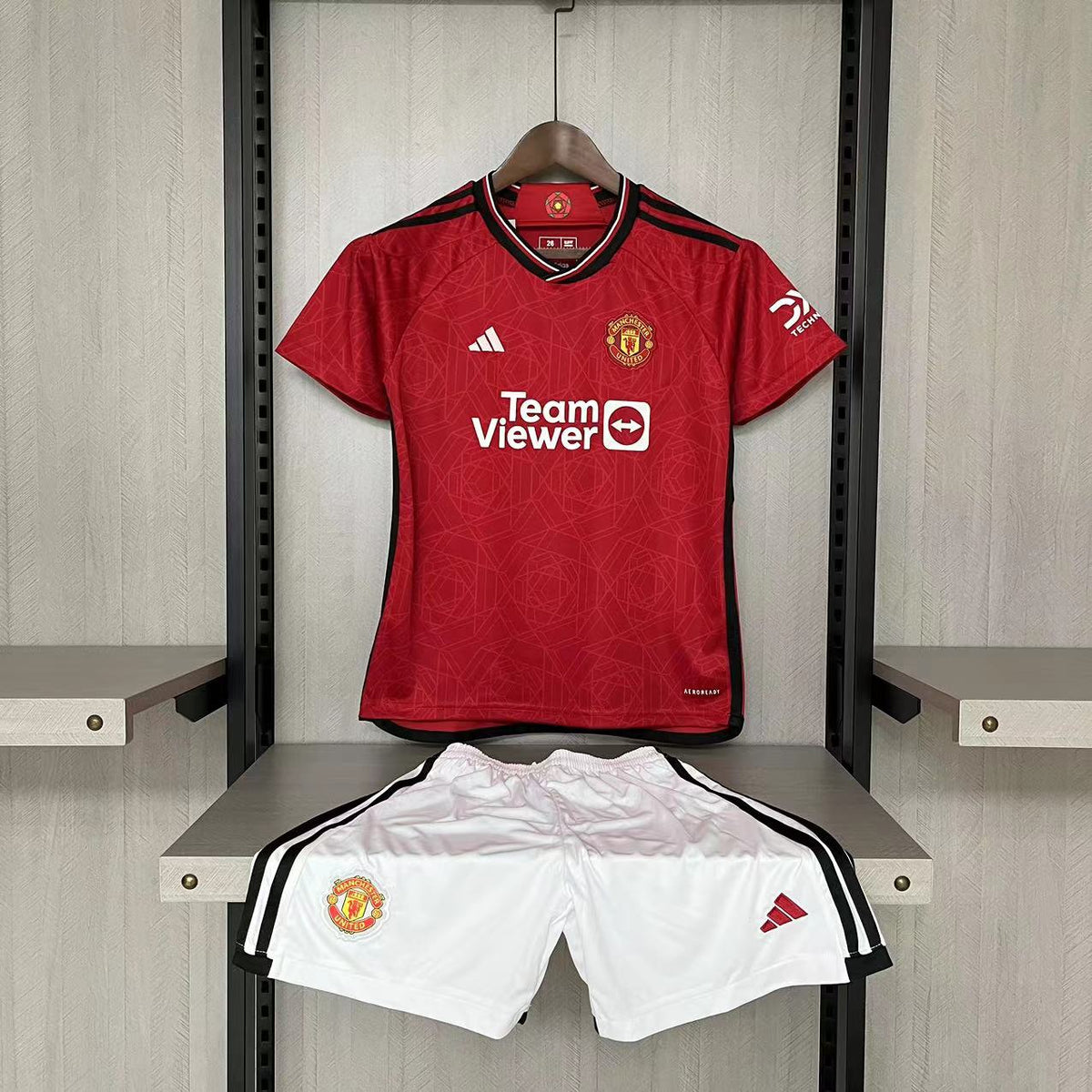 KIT INFANTIL MANCHESTER UNITED HOME 23/24