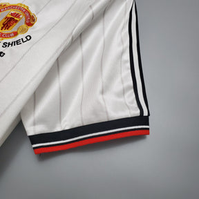 CAMISA RETRÔ MANCHESTER UNITED AWAY 1983