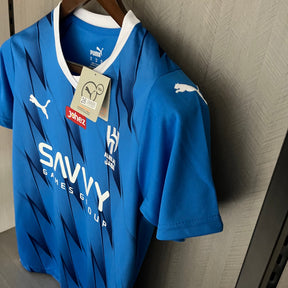 KIT INFANTIL AL-HILAL HOME 23/24