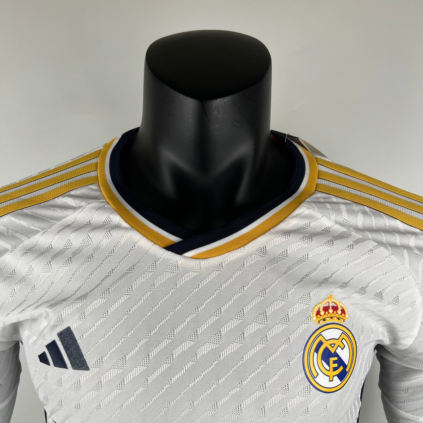 CAMISA REAL MADRID VERSÃO JOGADOR MANGA LONGA HOME 23/24