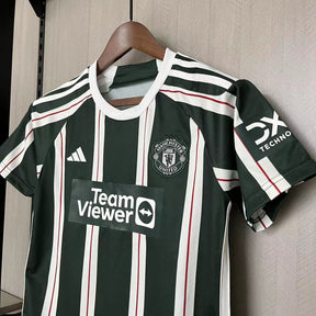 KIT INFANTIL MANCHESTER UNITED AWAY 23/24